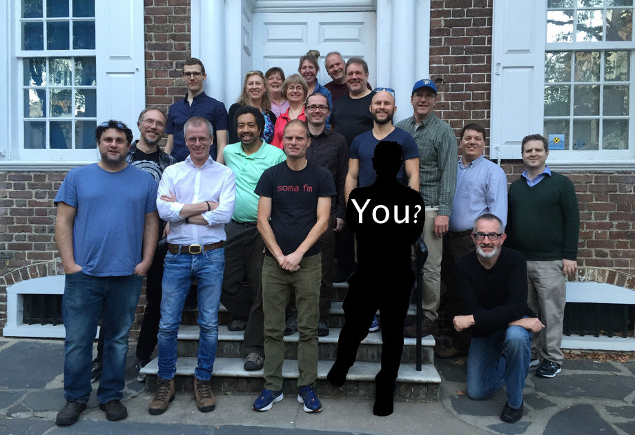 Photograph of Index Data staff with a silhouette of a person with the label 'you?'